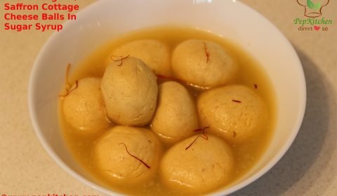 Kesar Rasgulla / Saffron Cottage Cheese Balls In Sugar Syrup